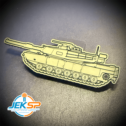 Front view of M1 Abrams Main Battle Tank patch in tan tank-shaped design with dark outlines