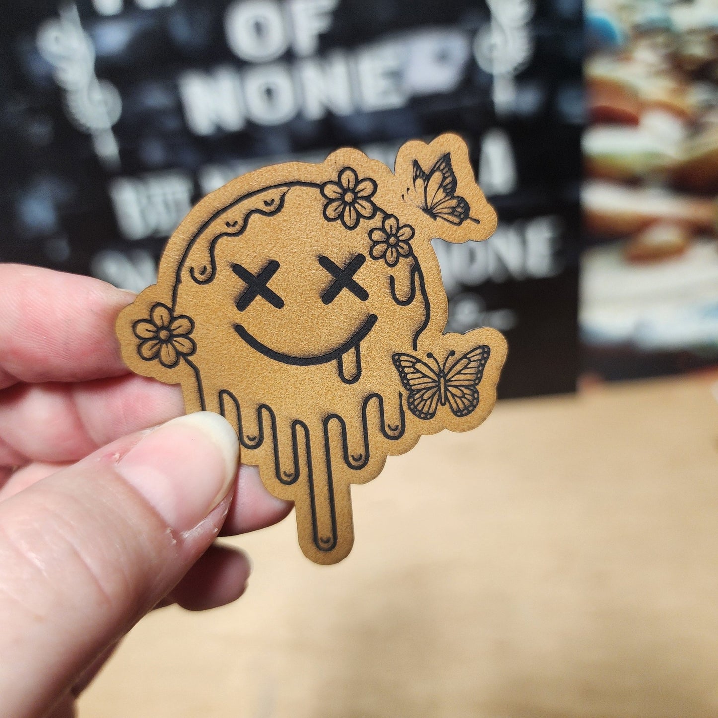Melting Smiley with Butterflies (Saddle Tan) Engraved Leatherette Hat Patch - MR01 - LoneStar Adhesive