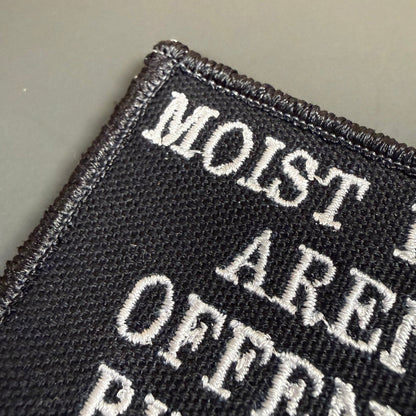 Moist People Aren’t Offended by Typos Funny Morale Patch, 2x3" | Made in USA | VELCRO® Brand Hook Backing - LoneStar Adhesive