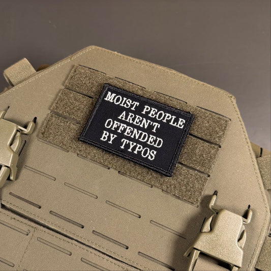 Moist People Aren’t Offended by Typos Funny Morale Patch, 2x3" | Made in USA | VELCRO® Brand Hook Backing - LoneStar Adhesive