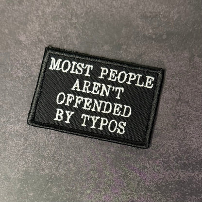 Moist People Aren’t Offended by Typos Funny Morale Patch | Made in USA | VELCRO® Brand Hook Backing - LoneStar Adhesive