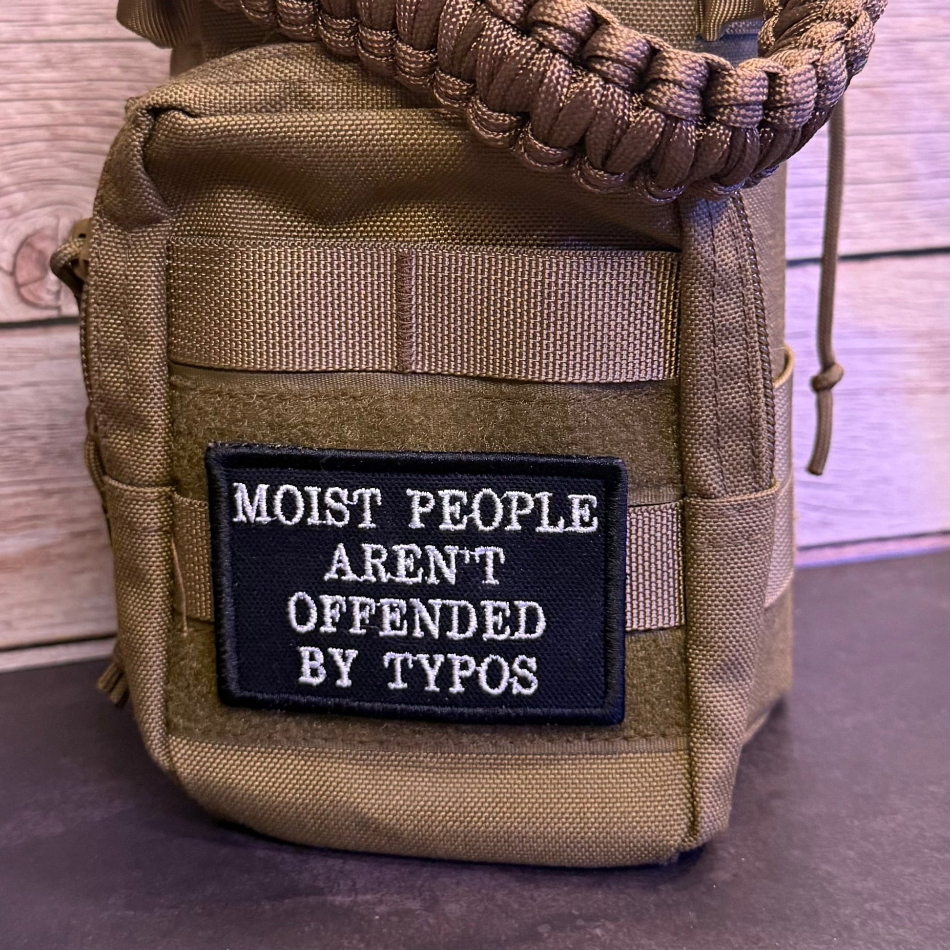 Moist People Aren’t Offended by Typos Funny Morale Patch | Made in USA | VELCRO® Brand Hook Backing - LoneStar Adhesive