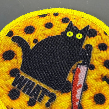 Murder Cat & Sunflowers patch in yellow with a black cat, sunflowers and a red knife, close-up of embroidery