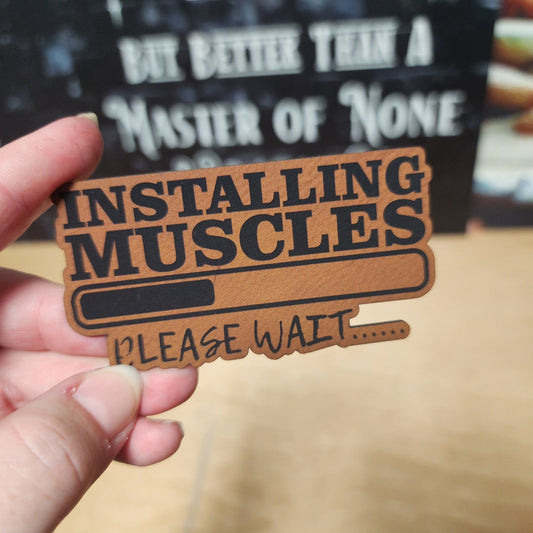 Muscle Installation In Progress (Rawhide) Engraved Leatherette Hat Patch - MR01 - LoneStar Adhesive