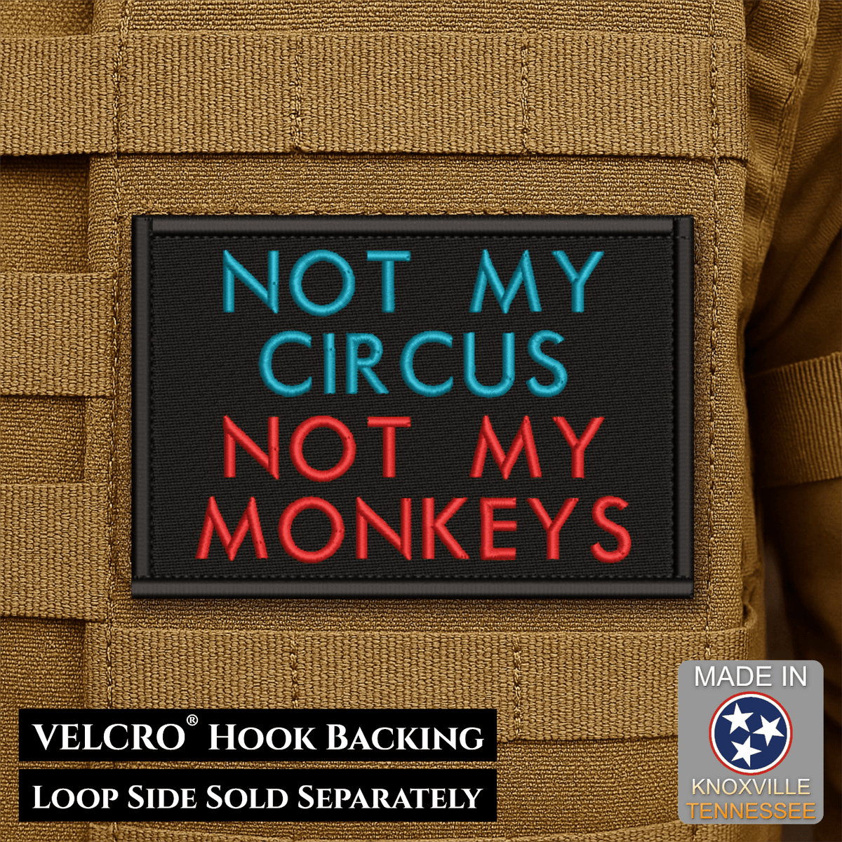 Front design and hook backing of Not My Circus, Not My Monkeys patch in black with teal and red lettering