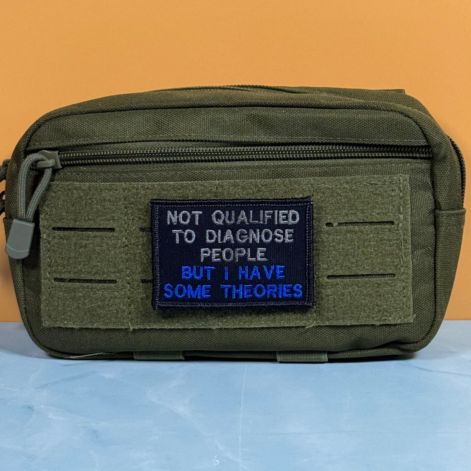Not Qualified to Diagnose People, But I Have Theories Funny Morale Patch, 2x3" | Made in USA | VELCRO® Brand Hook Backing - LoneStar Adhesive