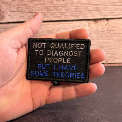 Not Qualified to Diagnose People, But I Have Theories Funny Morale Patch | Made in USA | VELCRO® Brand Hook Backing - LoneStar Adhesive