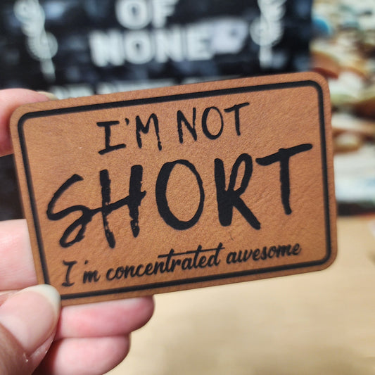 Not Short, Just Awesome (Rawhide) Engraved Leatherette Hat Patch - MR01 - LoneStar Adhesive
