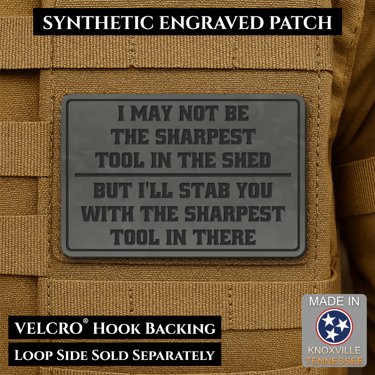Front design and hook backing of Not The Sharpest Tool In The Shed patch in charcoal gray