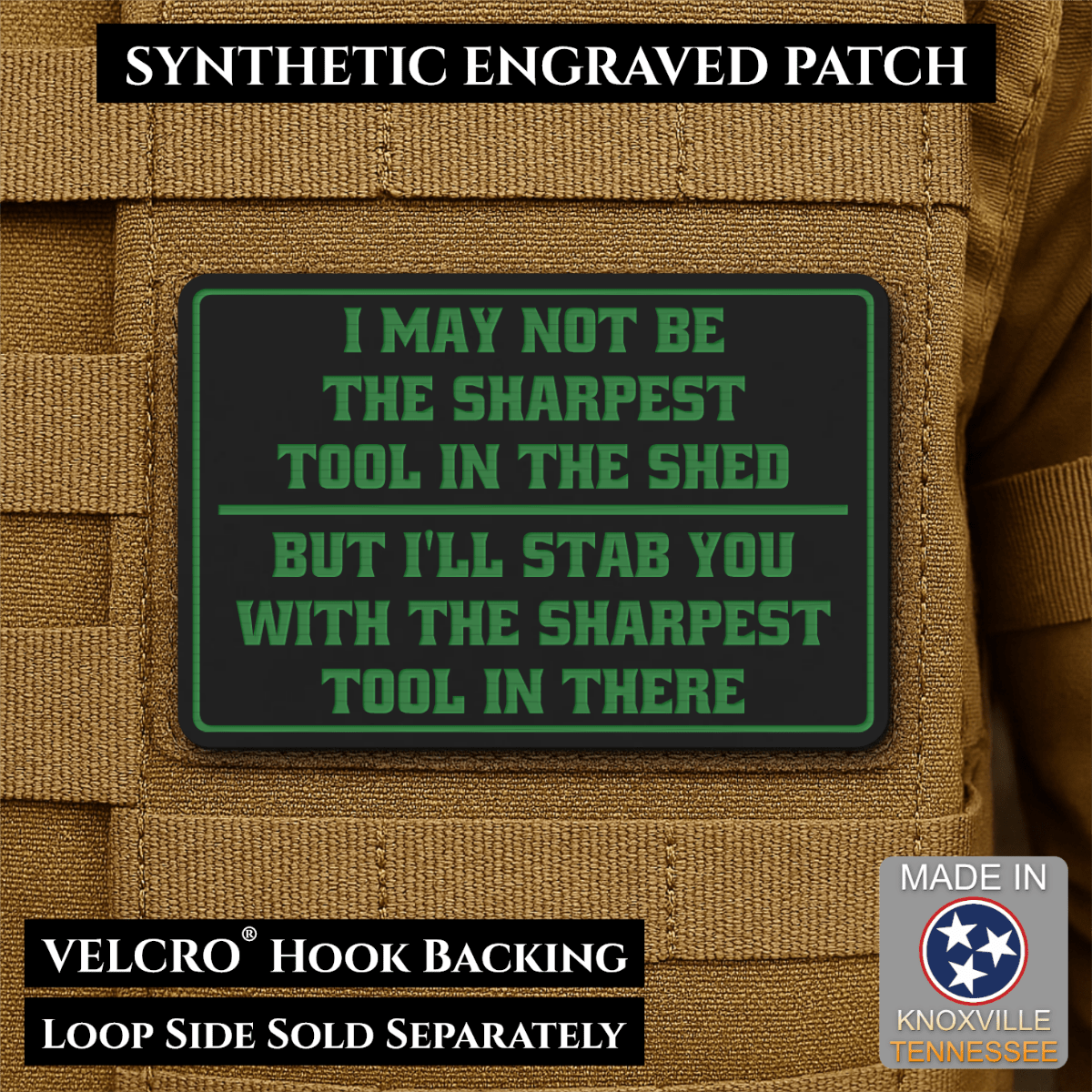 Front design and hook backing of Not The Sharpest Tool In The Shed patch in black / green