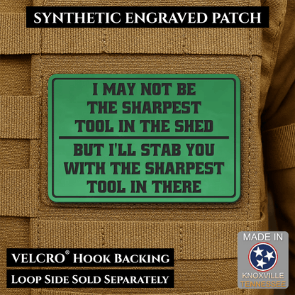 Front design and hook backing of Not The Sharpest Tool In The Shed patch in green