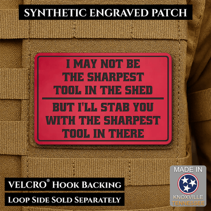 Front design and hook backing of Not The Sharpest Tool In The Shed patch in red