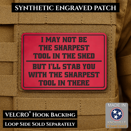 Front design and hook backing of Not The Sharpest Tool In The Shed patch in red