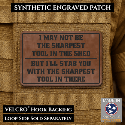 Front design and hook backing of Not The Sharpest Tool In The Shed patch in walnut faux leather