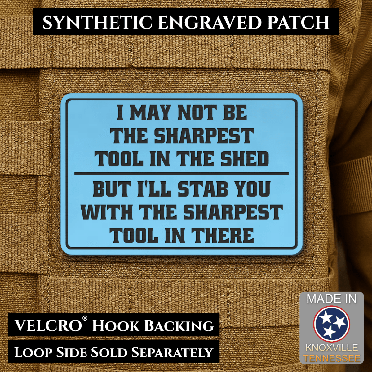 Front design and hook backing of Not The Sharpest Tool In The Shed patch in sky blue
