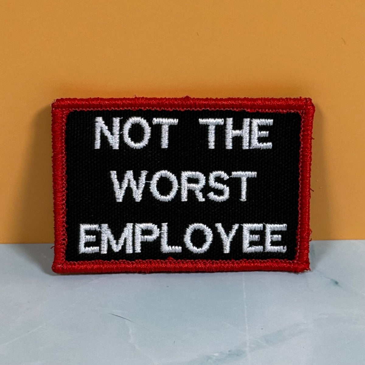 Not The Worst Employee Funny Morale Patch, 2x3" | Made in USA | VELCRO® Brand Hook Backing - LoneStar Adhesive