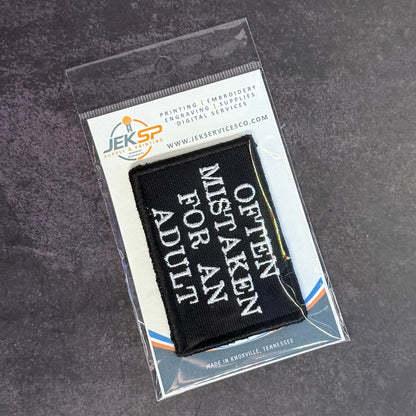 Often Mistaken For An Adult Funny Morale Patch, 2x3" | Made in USA | VELCRO® Brand Hook Backing - LoneStar Adhesive