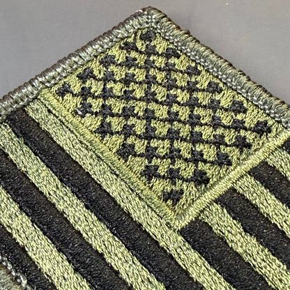 Olive OD Green Tactical American Flag patch in olive green and black stars and stripes, close-up of embroidery