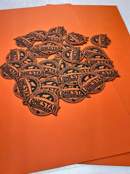 Orange/Schwarze Durra-Bull-Kunstlederblätter (12x24)