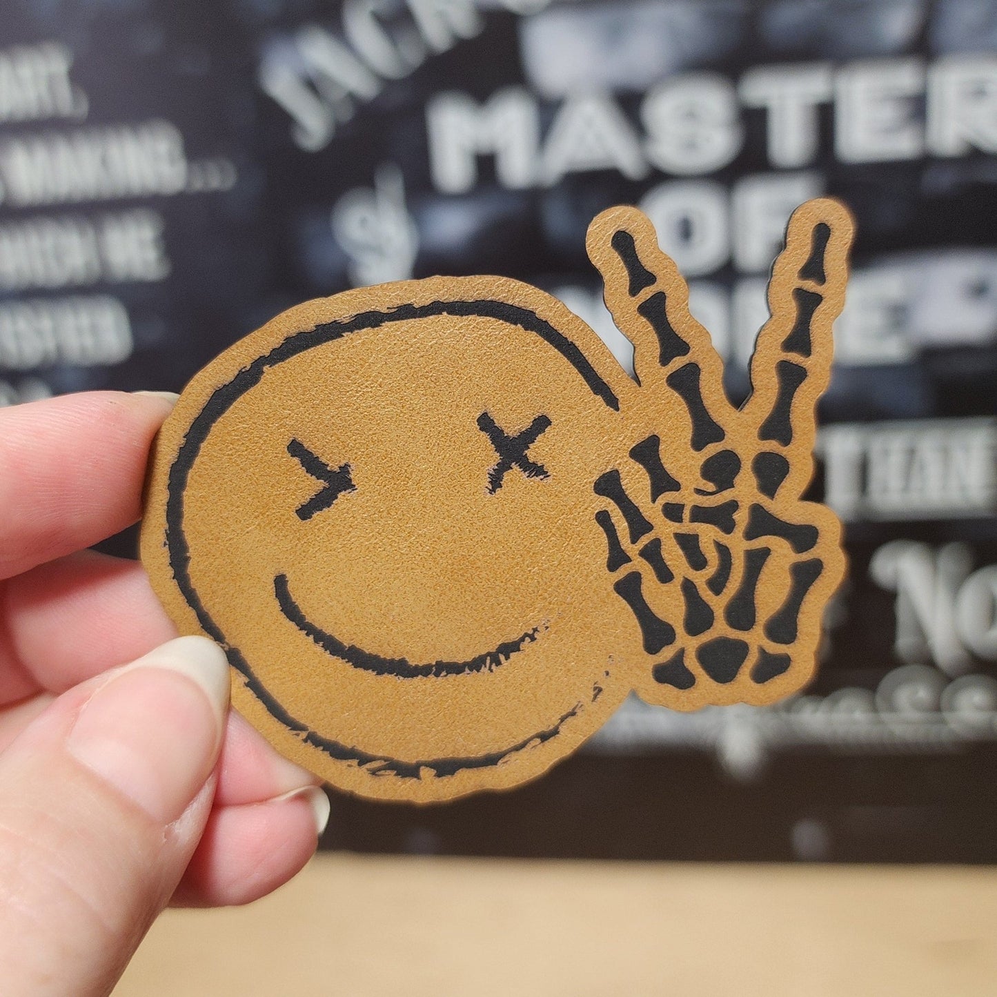 Peaceful Skull Smile (Saddle Tan) Engraved Leatherette Hat Patch - MR01 - LoneStar Adhesive