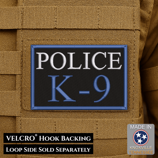 Front design and hook backing of Police K9 Dog patch in black with white POLICE and blue K-9 lettering and border