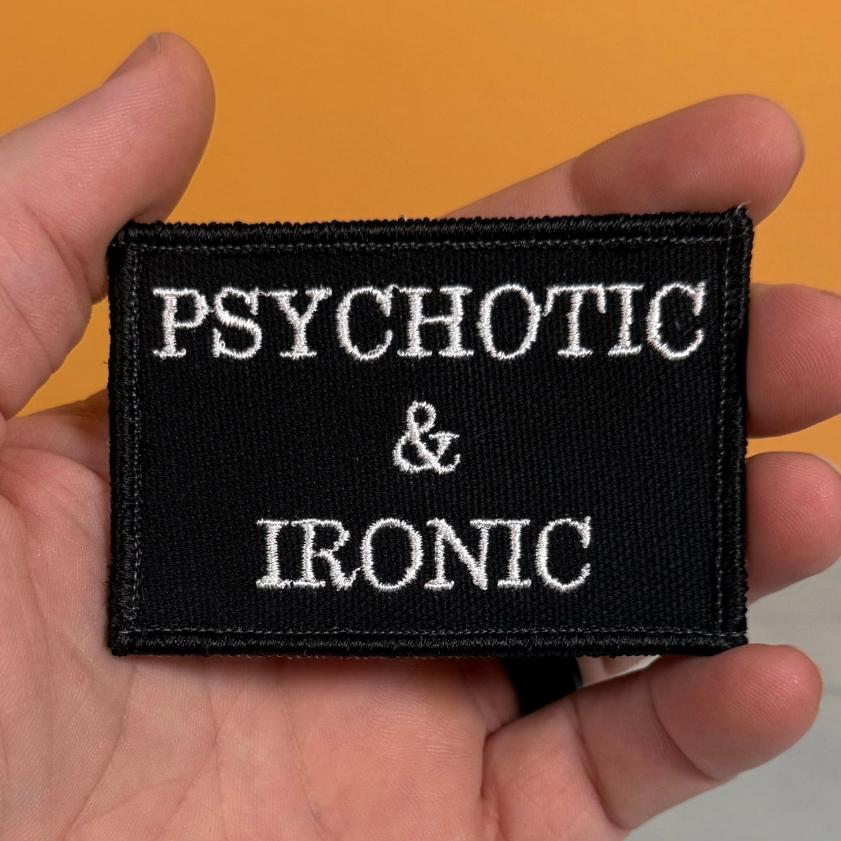 Psychotic and Ironic Funny Morale Patch, 2x3" | Made in USA | VELCRO® Brand Hook Backing - LoneStar Adhesive