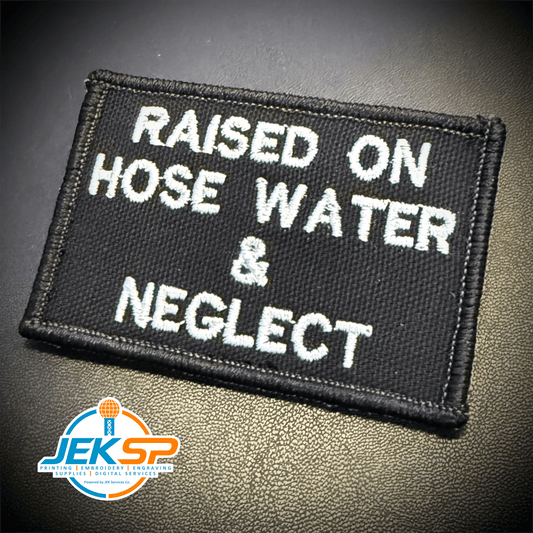 Front view of Raised on Hose Water & Neglect patch in black with white lettering