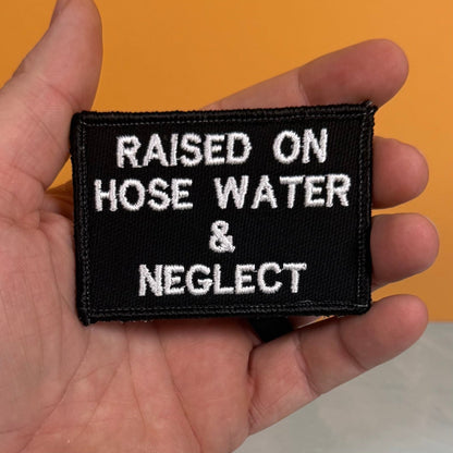 Raised on Hose Water & Neglect Funny Morale Patch, 2x3" | Made in USA | VELCRO® Brand Hook Backing - LoneStar Adhesive