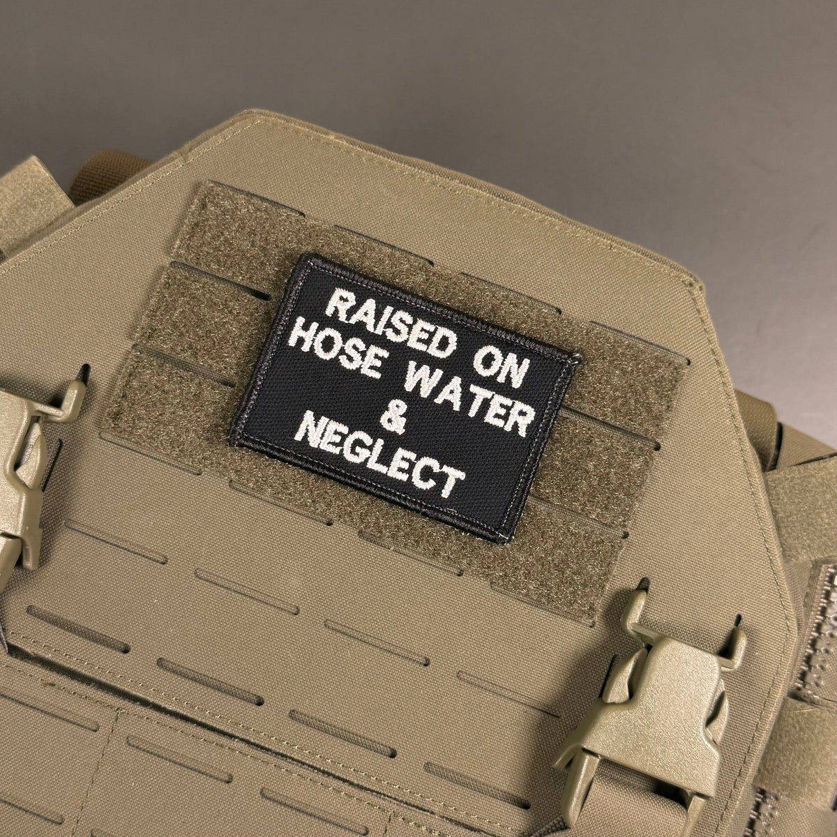 Raised on Hose Water & Neglect Funny Morale Patch, 2x3" | Made in USA | VELCRO® Brand Hook Backing - LoneStar Adhesive