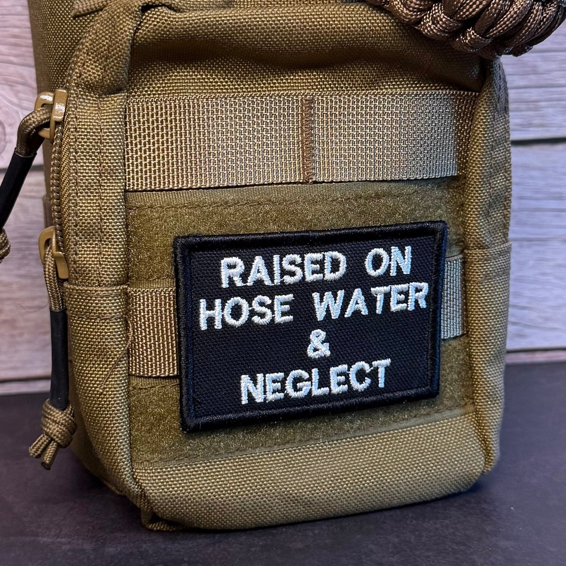 Raised on Hose Water & Neglect Funny Morale Patch | Made in USA | VELCRO® Brand Hook Backing - LoneStar Adhesive