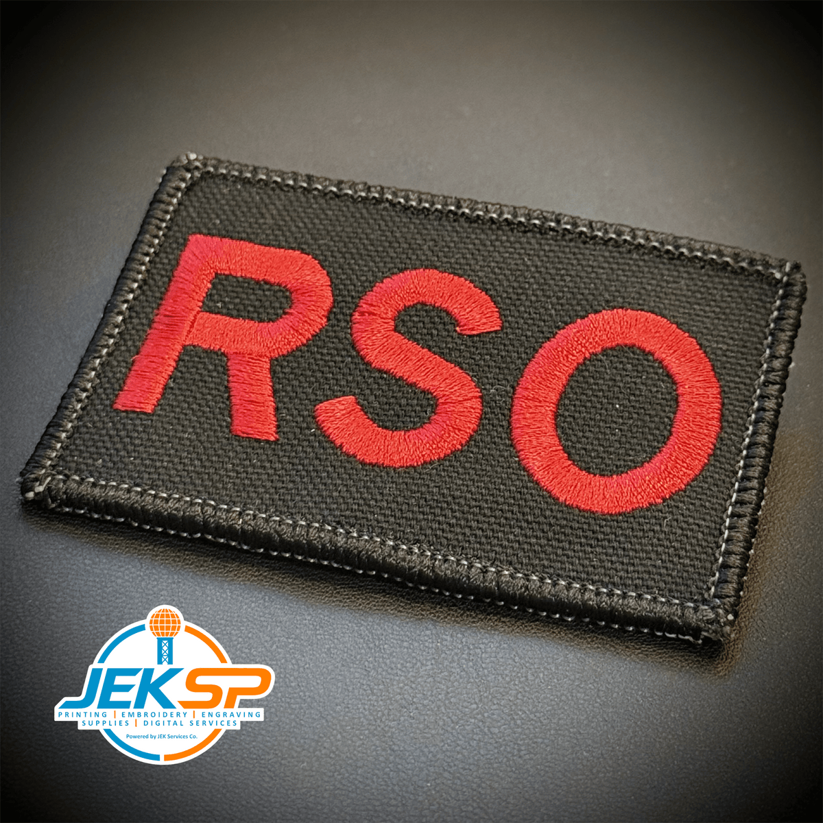Front view of Range Safety Officer Patches & ID Panels patch in black with red RSO lettering