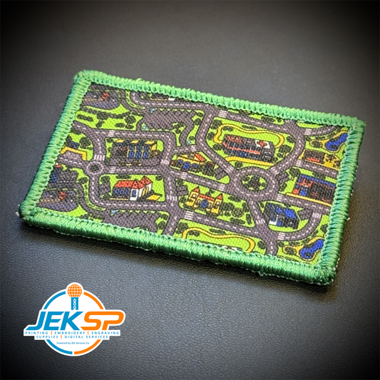 Front view of Retro Toy Car Rug Carpet patch in multicolored toy-road-map design with a green border
