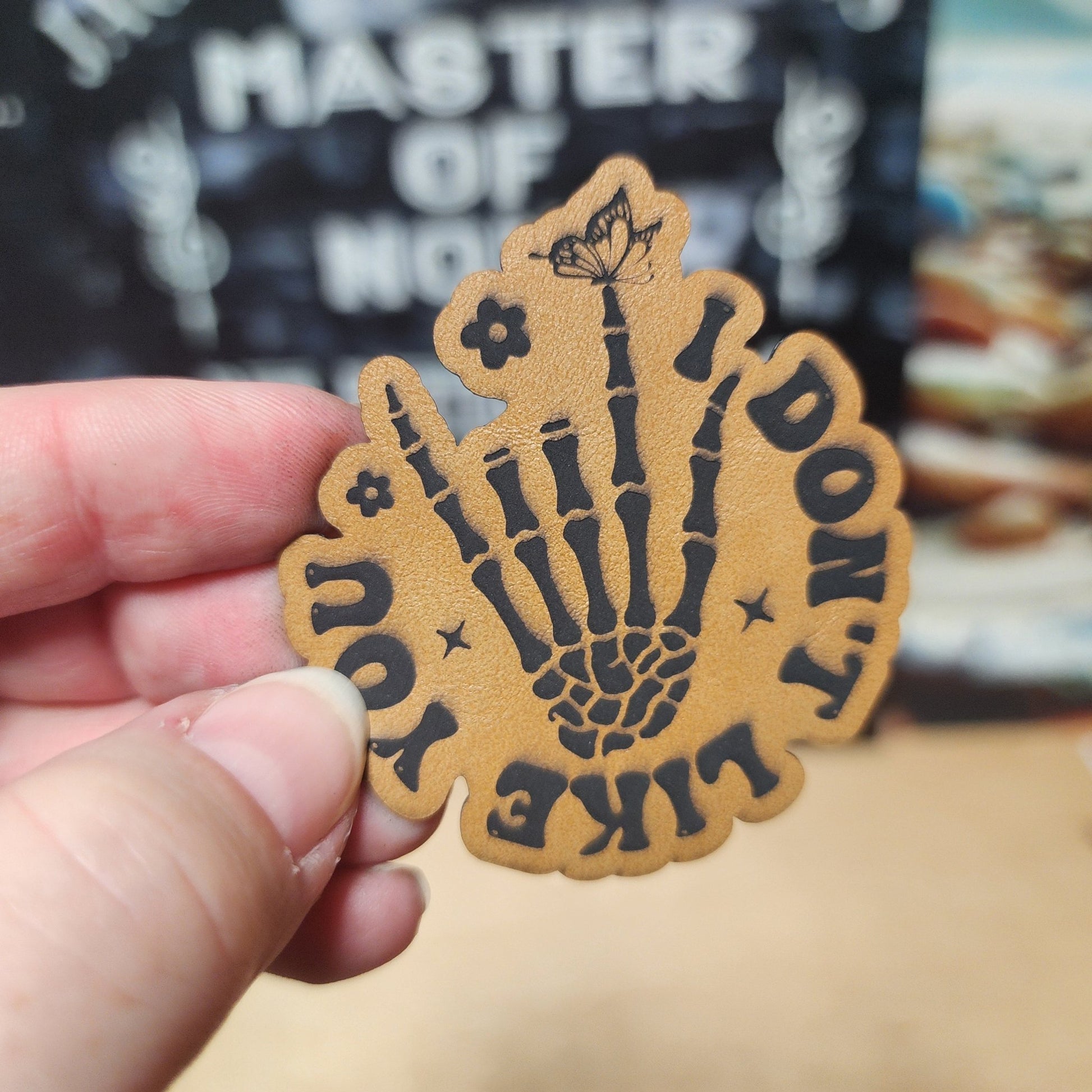 Skeleton Hand, Not Likable (Saddle Tan) Engraved Leatherette Hat Patch - MR01 - LoneStar Adhesive