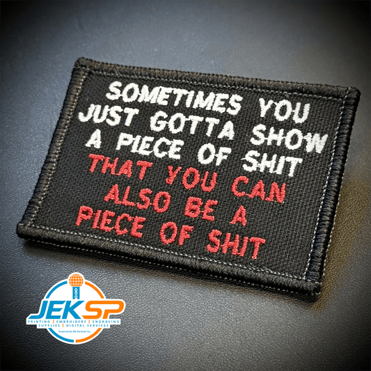 Front view of Sometimes You Just Gotta Show a Piece of Shit patch in black with white and red lettering
