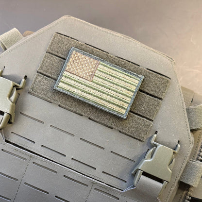 Subdued FDE Tactical American Flag patch in subdued tan and green American flag, mounted on a tan plate carrier