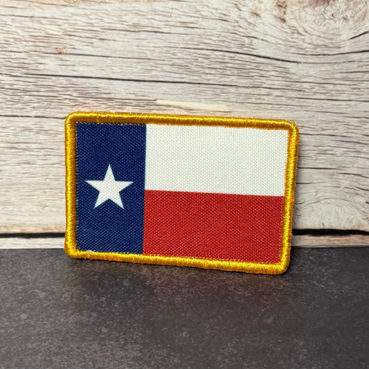 Front view of Texas State Flag patch in red-white-blue Texas flag with a white star and yellow border