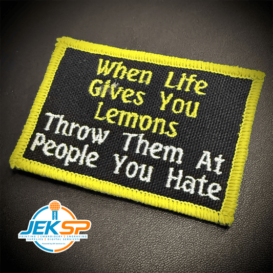 Front view of Throw Lemons At People You Hate patch in black with yellow and white lettering and a yellow border
