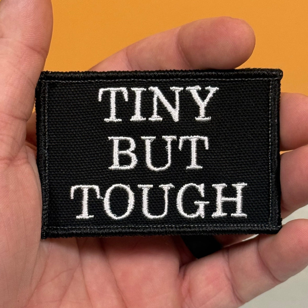 Tiny But Tough Funny Morale Patch, 2x3" | Made in USA | VELCRO® Brand Hook Backing - LoneStar Adhesive