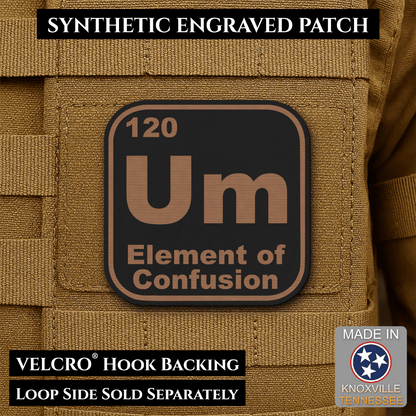 Front design and hook backing of Um, The Element of Confusion patch in black / copper
